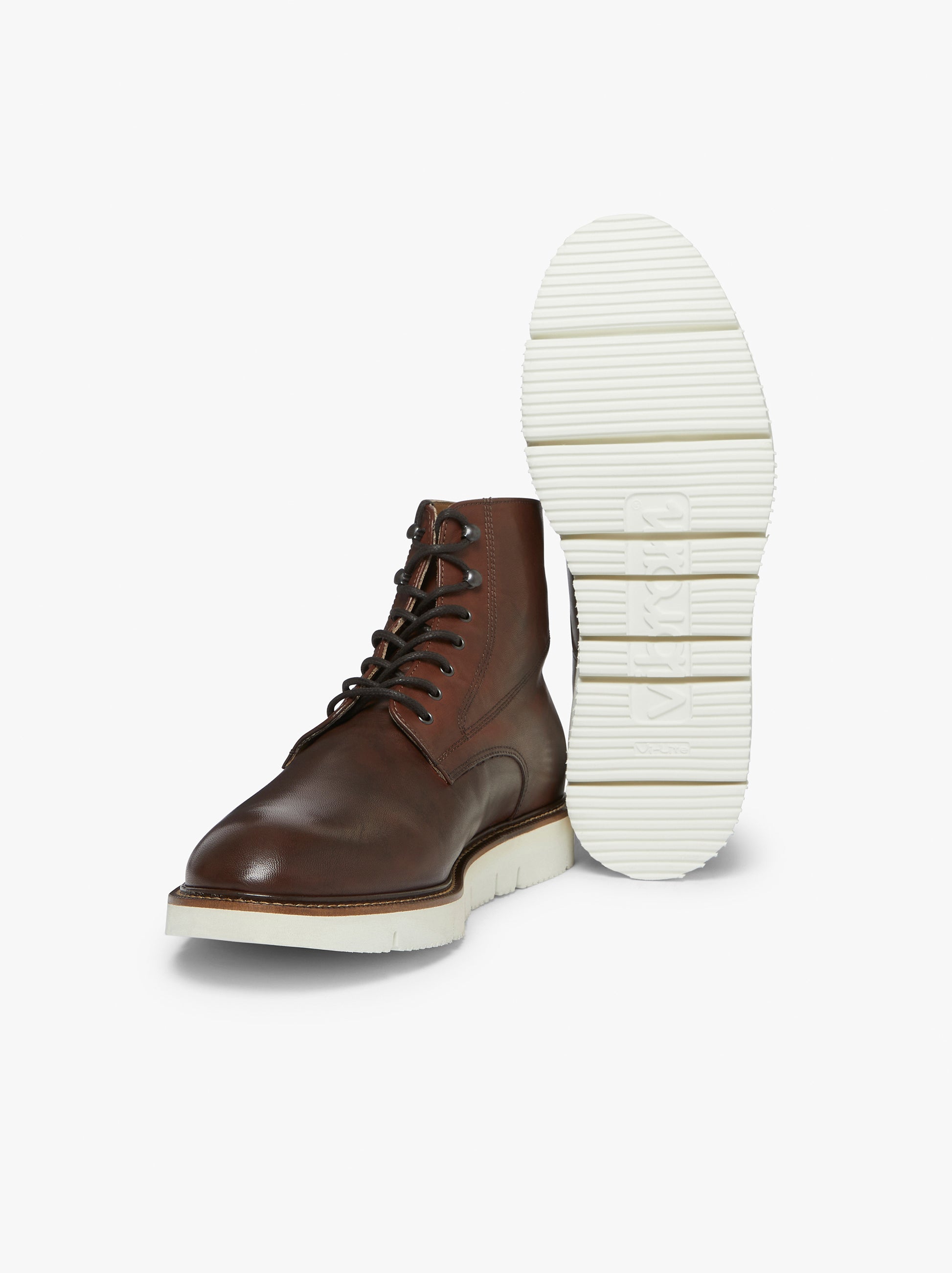 Brown leather outlet boots white sole